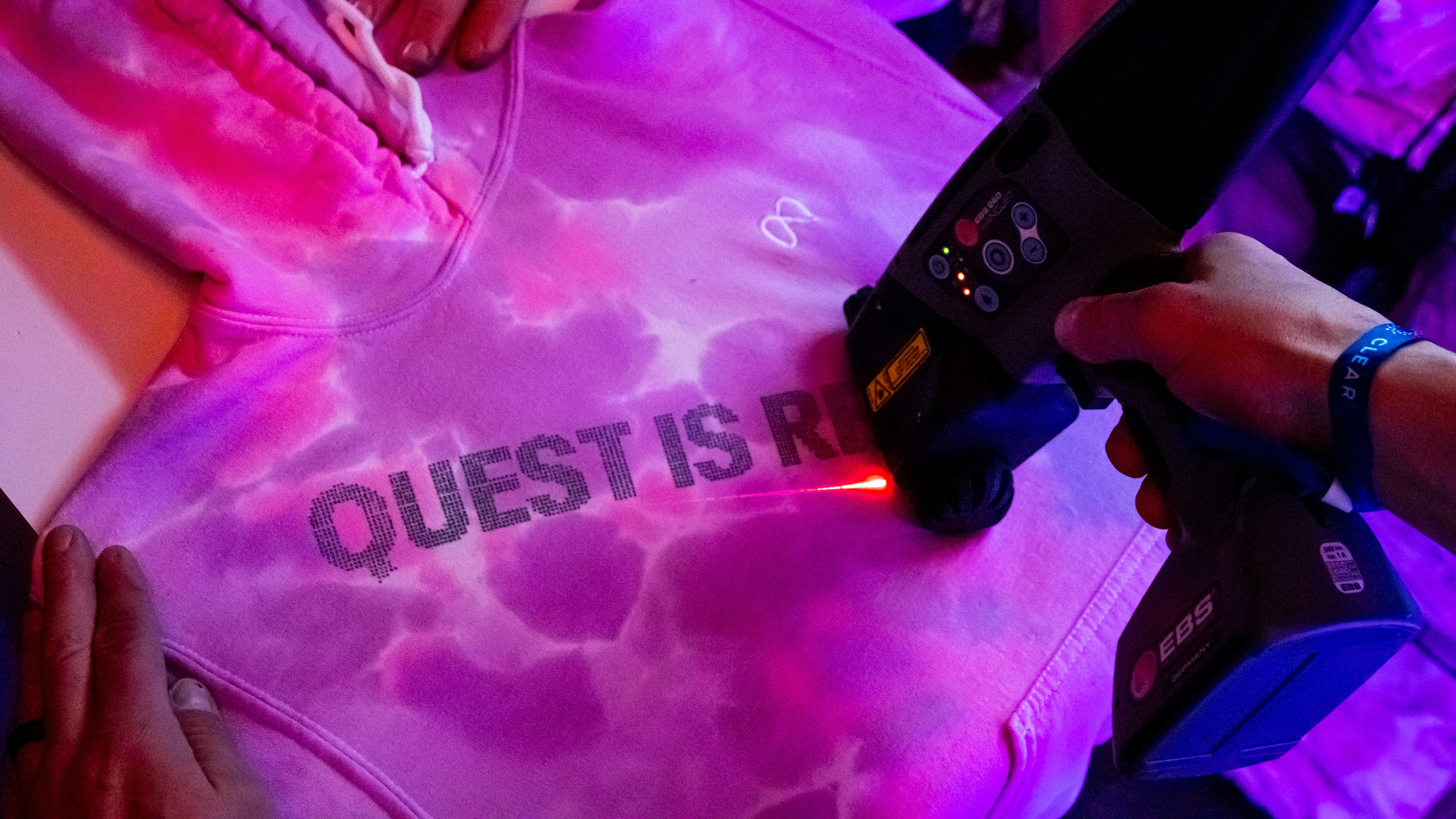 Custom merch being printed on-site for attendees